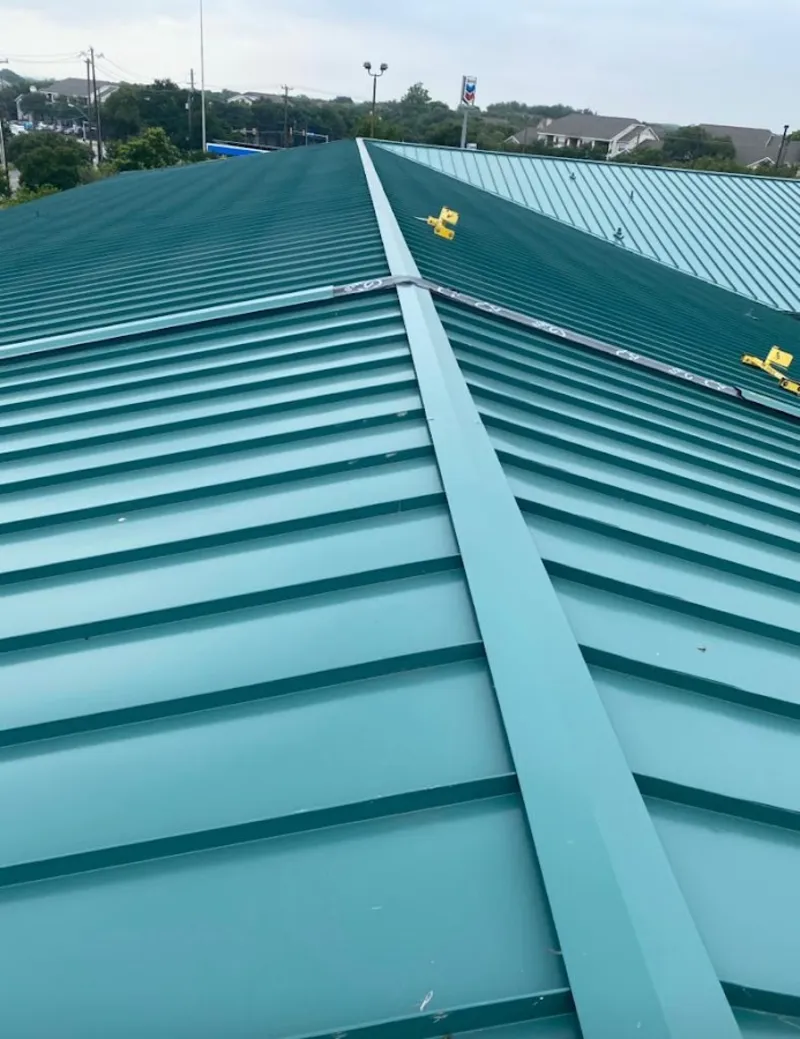 Green commercial metal roof ridge and valley for Metal Roof Repair in Hot Springs Village