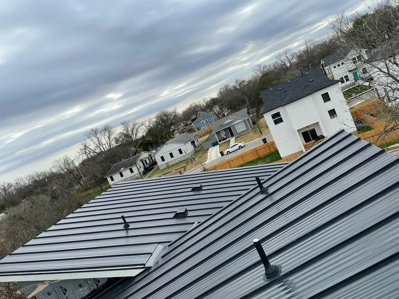Standing seam metal roof panels with vents for Skylight Repair in Hot Springs Village
